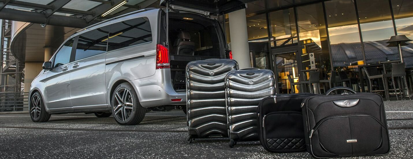 Chauffeur meeting a client in a London airport terminal